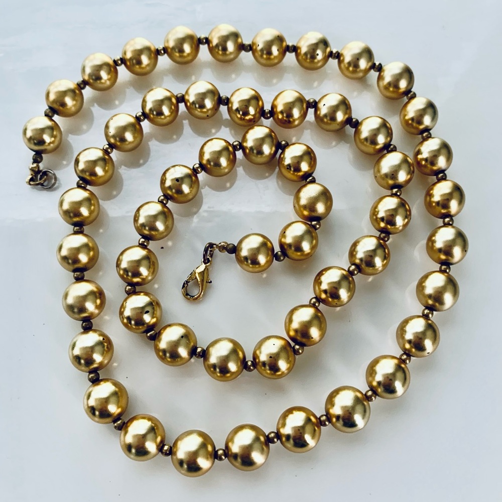 The look is golden. 31” single strand